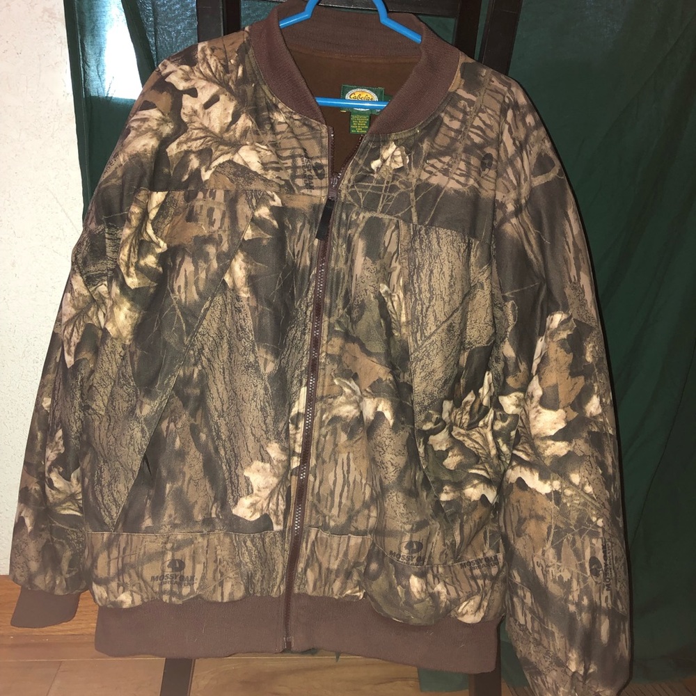 Woman’s camo jacket worn